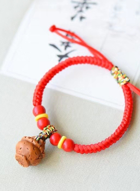 纯手工编织红绳手链 手工雕刻桃核小提篮手链 红手绳手链本命年