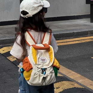 幼儿园小学生儿童书包2025新款时尚撞色男女孩外出游轻便研学背包