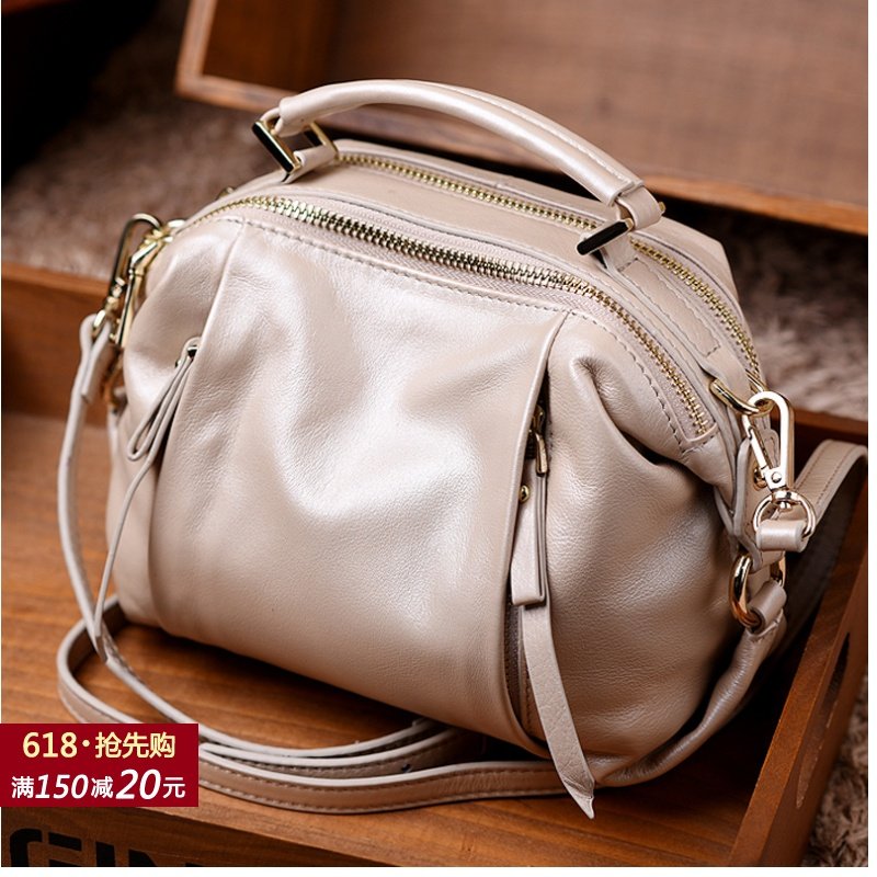 欧美春夏新款简约百搭头层牛皮波士顿枕头包真皮小包手提斜跨女包