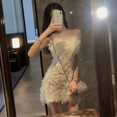 法式 重工蕾丝白色连衣裙女夏纯欲风设计感小众超仙流苏羽毛吊带裙