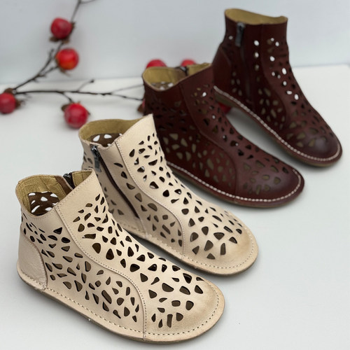 丑乐真皮镂空透气夏季女马丁靴