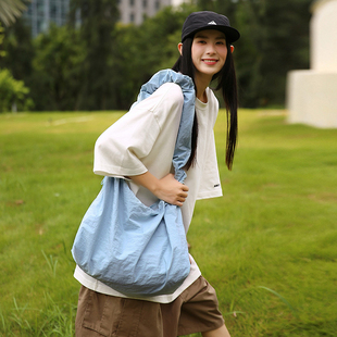 2026春季百搭休闲单肩斜跨托特包简约风大容量饺子包女