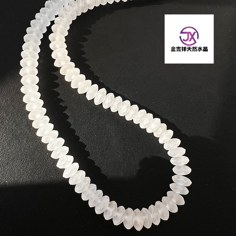 天然巴西白水晶磨砂算盘珠切面图片