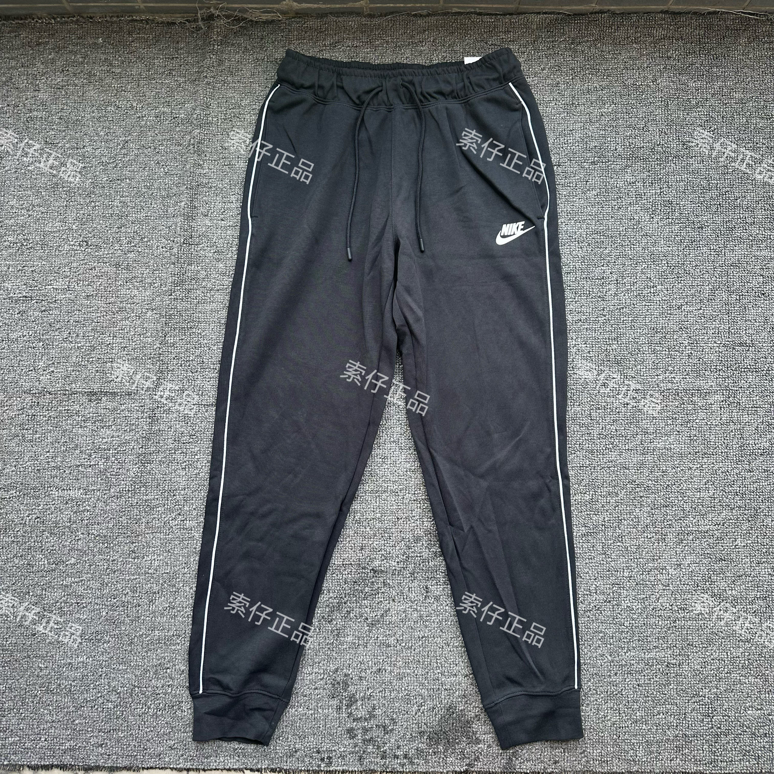 耐克/NIKE 女子秋季运动跑步训练休闲透气束脚针织收口长裤CZ8341
