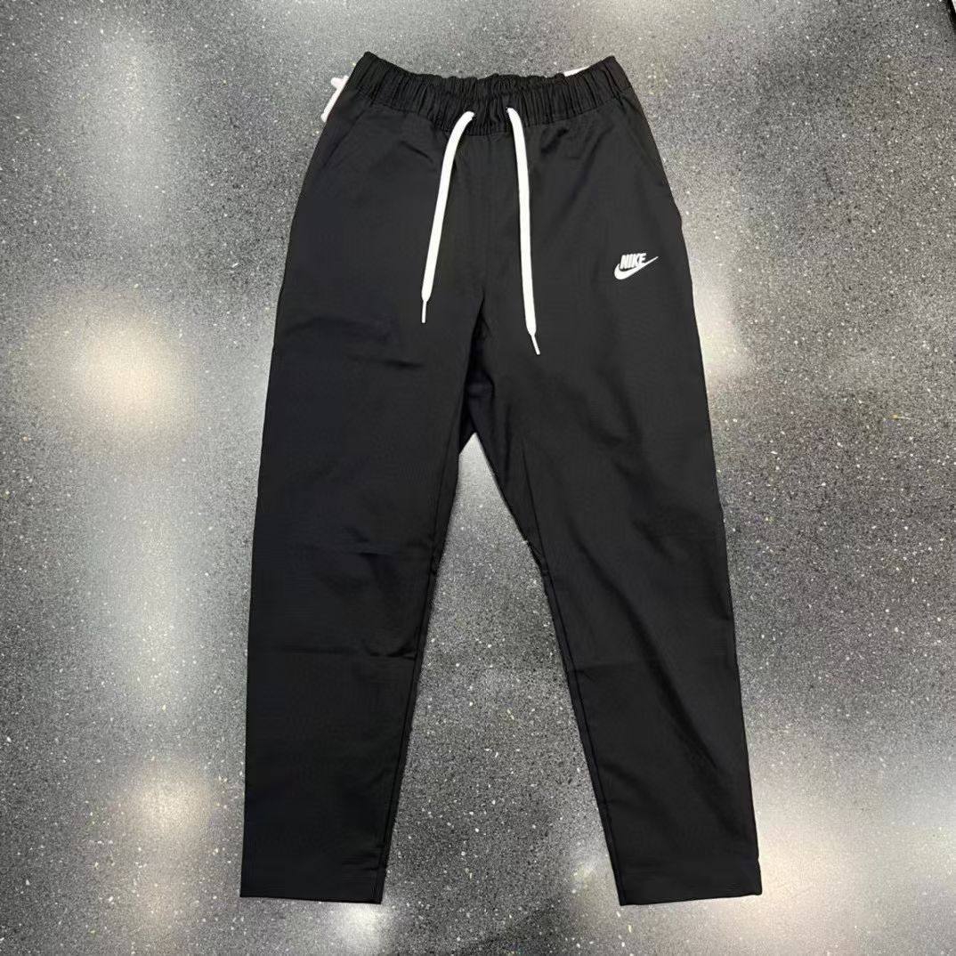 Nike/耐克 男子春秋跑步训练运动休闲透气刺绣梭织收腿长裤DX0625