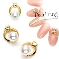 Nhật Bản Nail Art Alloy Trang sức DIY Quang trị liệu Nail Ba Lan Nail Phụ kiện trang trí Golden Heart Pearl Jewelry - Sơn móng tay / Móng tay và móng chân màu sơn móng đẹp