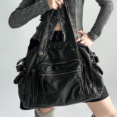 真皮软皮朋克机车大容量手提女包2025复古通勤托特旅行单肩斜挎包
