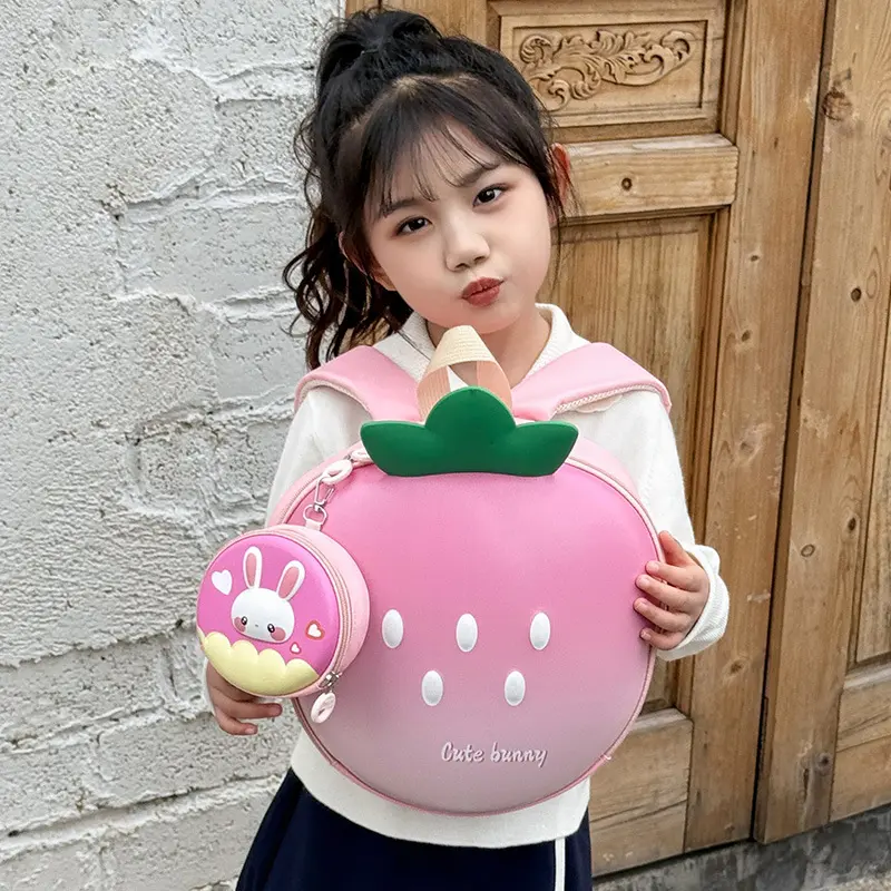 可爱幼儿园书包女童草莓蛋壳双肩包小班入学男童宝宝外出轻便背包