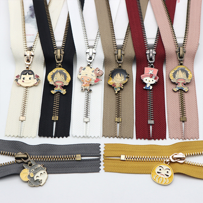 金属铜牙闭尾拉链卡通点油工艺头