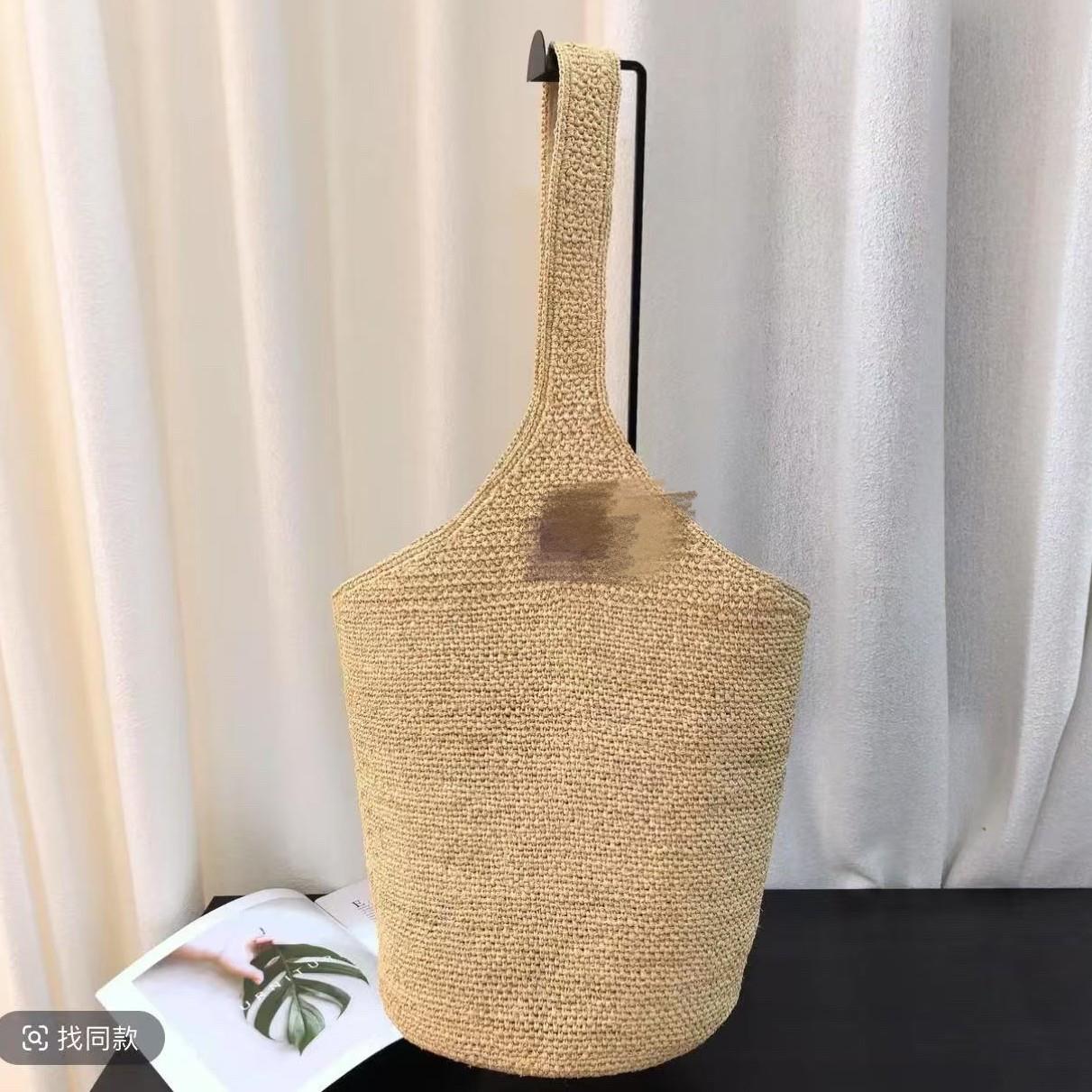 日本拉菲草水桶包女休闲度假真皮草编斜挎包编织包大容量单肩包