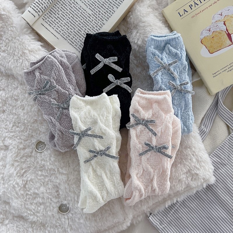 外穿女士珊瑚绒蝴蝶结中筒袜图片