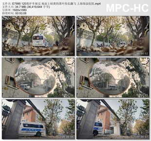 120救护车驶过地面枯黄落叶纷乱翻飞上海瑞金医院 实拍视频素材