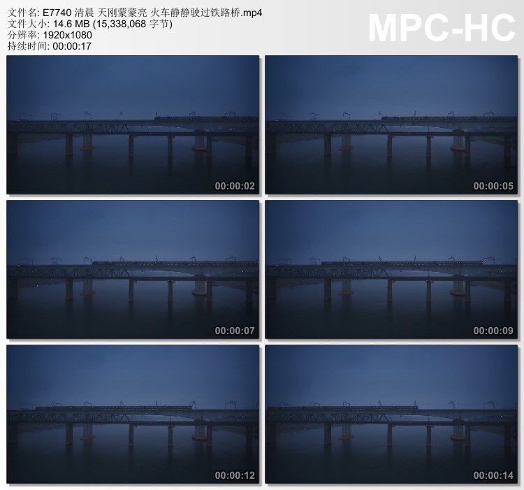 清晨天刚蒙蒙亮 火车静静驶过铁路桥 实拍视频素材