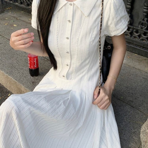 2025年夏季新款日系甜美白色连衣裙收腰褶皱气质拼接a字中长款裙