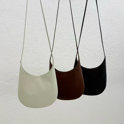 STATEMENT简约可爱斜跨牛皮包包