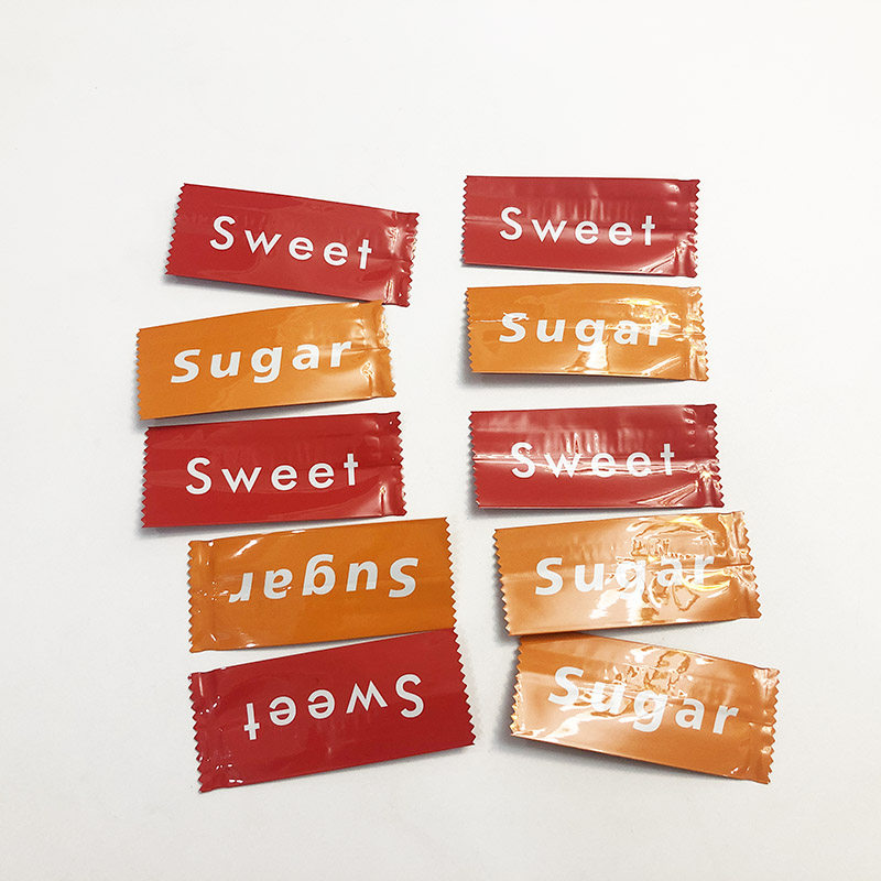 200个)橘色红色英文字铝箔牛轧糖袋 咖啡糖太妃糖迷你小袋子糖果