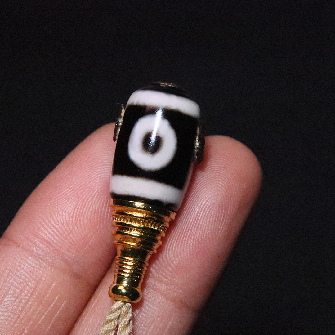 天珠玛瑙古法金两眼三通佛头