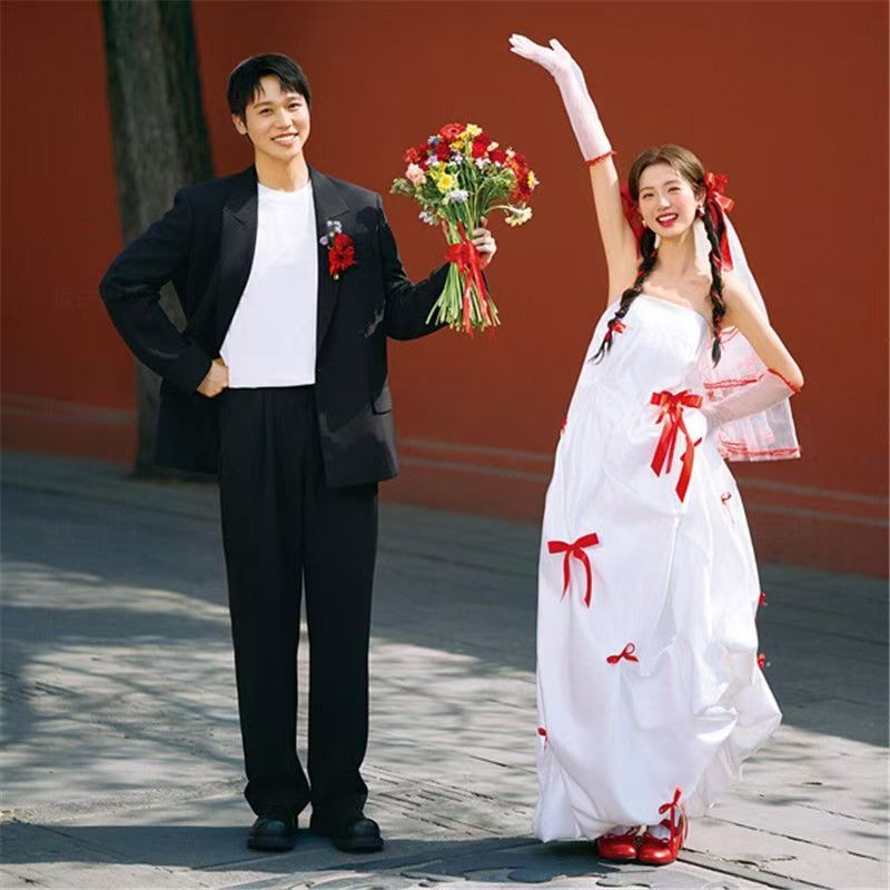 新款影楼拍照主题喜嫁婚纱红色蝴蝶结白纱礼服裙街拍旅拍摄影服装