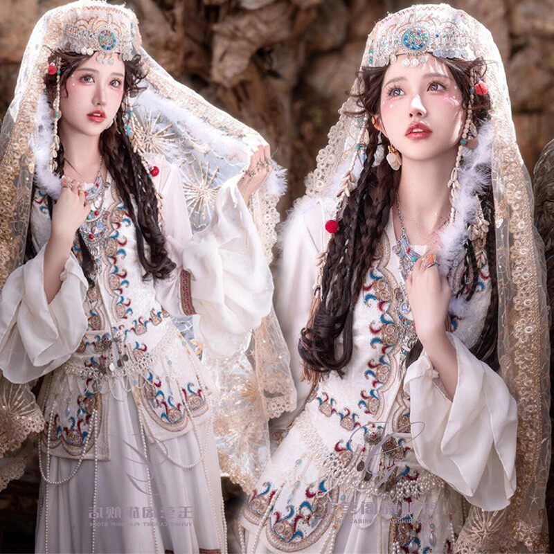 新款云南丽江古城旅拍服饰少数民族风写真摄影服装异域风情旅拍服