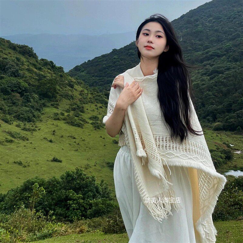 云南旅游民族风披肩女款纯色大号镂空连帽斗篷流苏毛衣针织衫