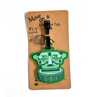 Багажная бирка, бронзовая маска