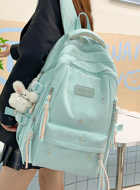 高颜值书包女生2025新款高中生初中生蝴蝶结背包小学生减负双肩包