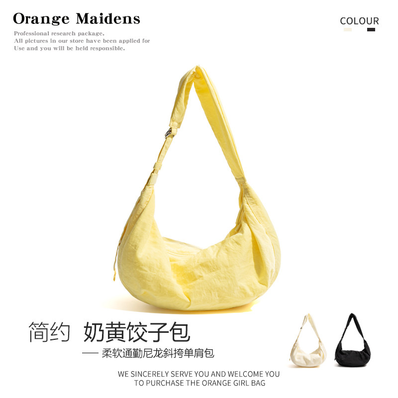 橙子少女韩系黄色简约饺子包通勤新款帆布包大容量斜挎包百搭月牙