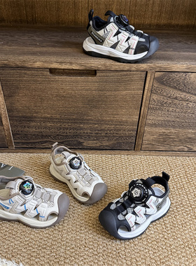 9875旋转纽扣儿童运动凉鞋2026夏款网面包头镂空户外休闲沙滩鞋潮