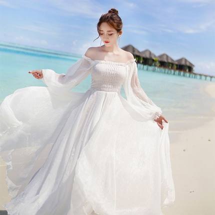 马尔代夫度假裙海边超仙沙滩裙2024新款长裙雪纺一字肩白色连衣裙