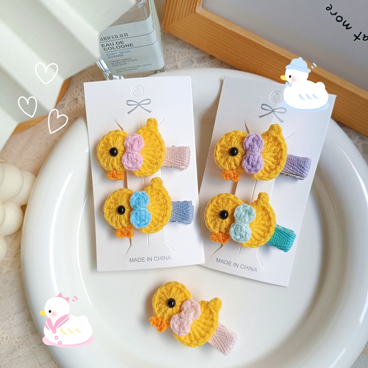 手工钩织毛线小鸭发夹可爱蝴蝶结全包鸭嘴夹儿童不伤头皮边夹成品