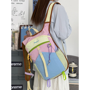 多巴胺撞色小众运动轻便书包学生防水双肩包户外徒步登山旅行背包