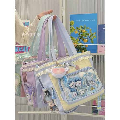 学院风少女斜挎包蝴蝶结荷叶边大容量透明单肩包谷子扎板痛包娃包