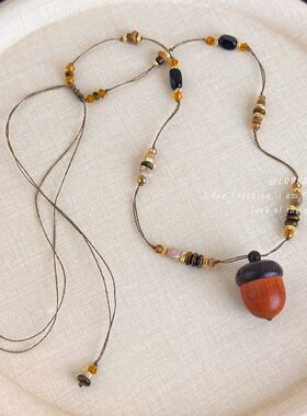 秋冬木质松果虎眼石串珠编绳秋冬长项链2026新款小众设计毛衣链女