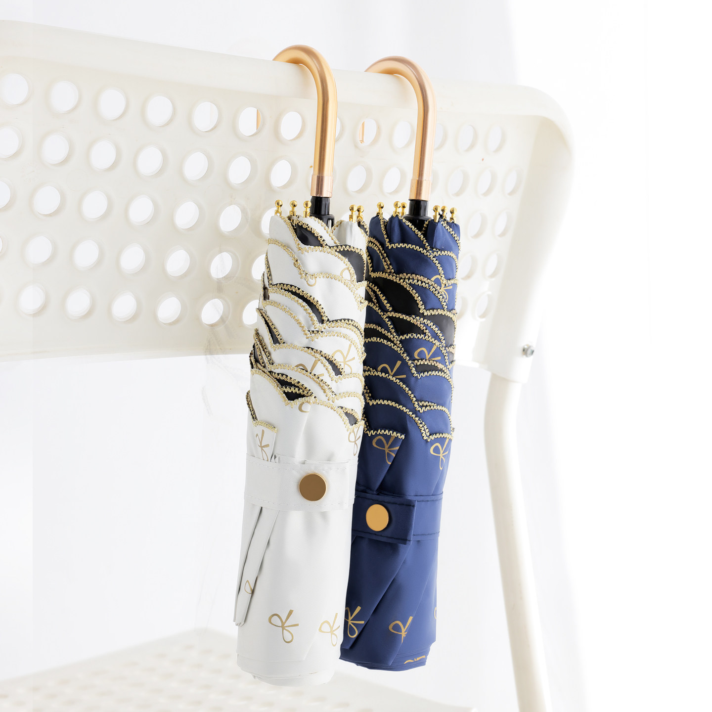 蝴蝶结刺绣超轻太阳伞黑胶遮阳防晒防紫外线三折叠雨伞女晴雨两用