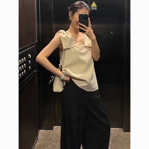 赫本风米白色蝴蝶结吊带背心女夏季新款好看甜美温柔显瘦上衣法式