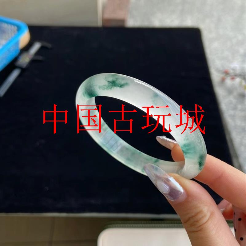 高冰独龙玉飘蓝花冰种手镯翡翠色