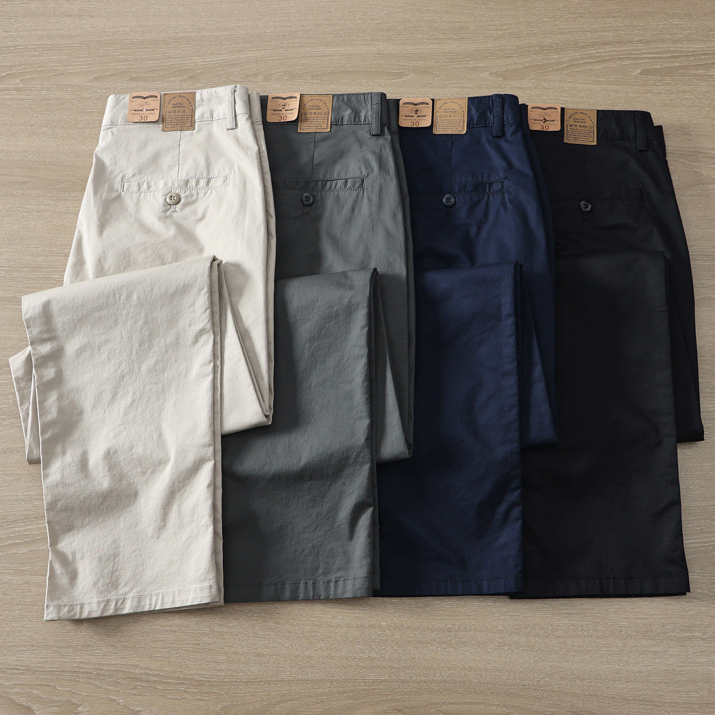 2026春夏薄款微弹力休闲长裤水洗棉感男士小直筒通勤简约黑色裤子