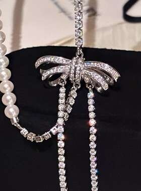 深圳旭佳旭家满钻蝴蝶结流苏正圆施家珍珠长款毛衣链女高级感气质