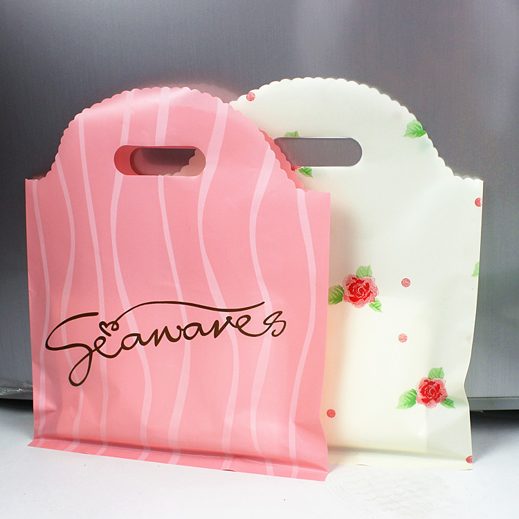 包邮加厚英文玫瑰花边服装袋包装袋手提袋礼品袋塑料袋子男女