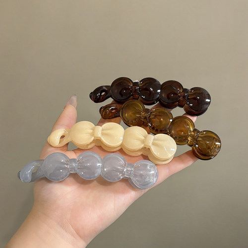 诗情画意简约蝴蝶结香蕉夹