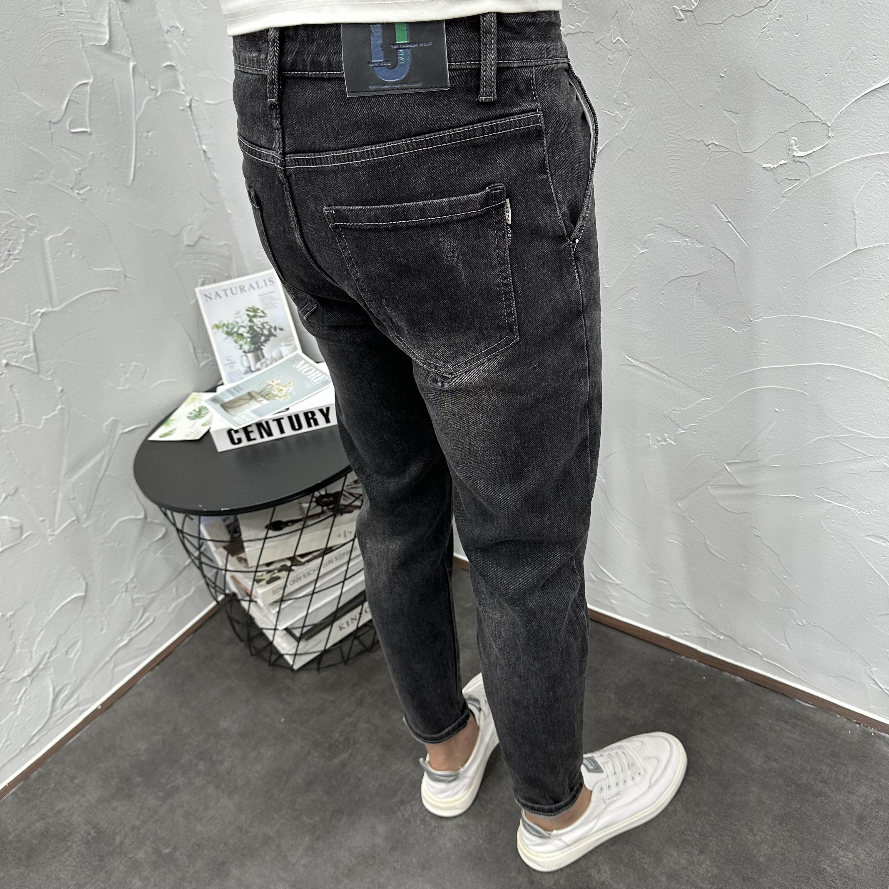 斜插口袋水洗微跨修身小脚牛仔裤