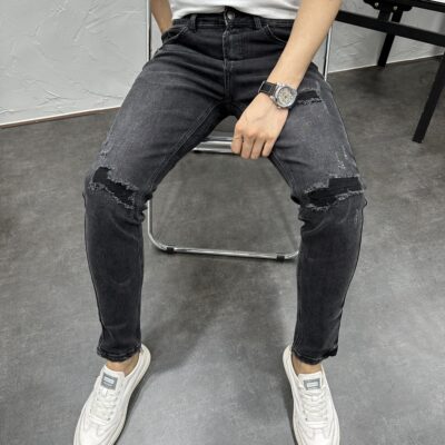 破洞黑灰水洗弹力修身小脚牛仔裤