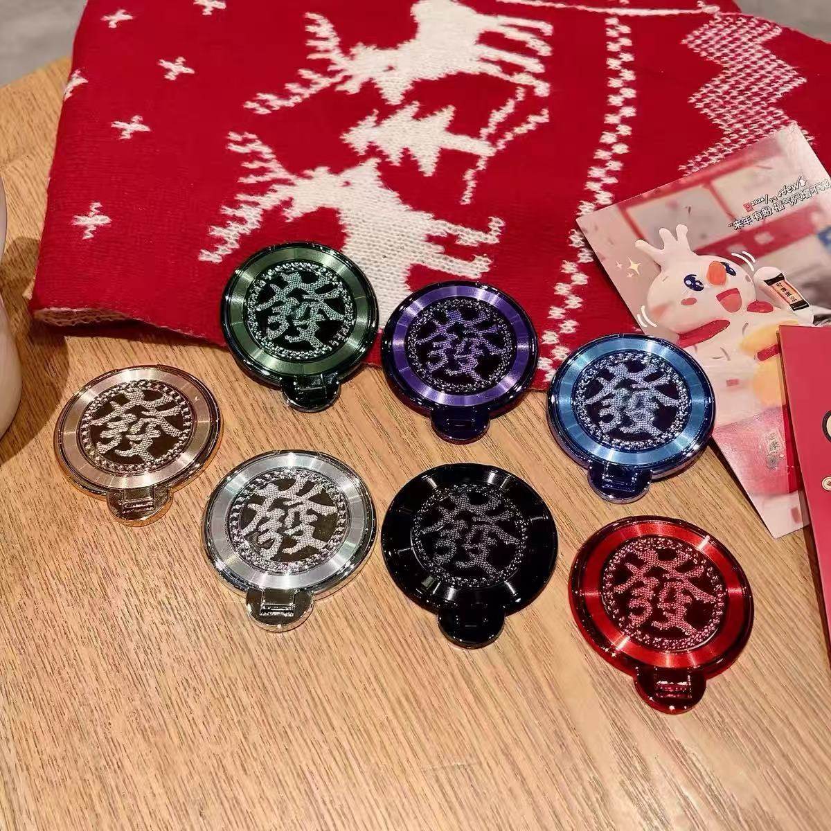 發財字陀螺旋转支架新年红发财手机支架适用华为苹果通用背贴配件