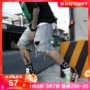 Thời trang đường phố thời trang hip-hop khoét lỗ quần short denim size lớn nam triều năm điểm quần béo người đàn ông cộng với phân bón tăng - Quần short quần tây