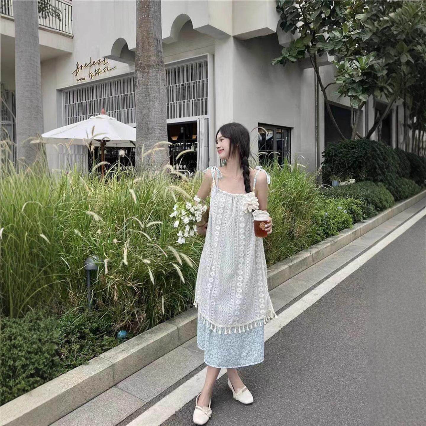 三亚度假流苏拼接碎花吊带连衣裙女春款气质显瘦沙滩裙长裙子