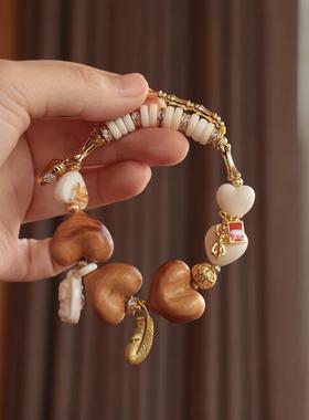 原创崖柏屁桃手炼搭配驼骨爱心无相佛隔片纯铜配饰佛珠手串