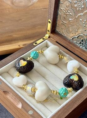 天然象牙果屁桃牛骨爱心沉香镶嵌爱心白水晶跑环菱镁矿爱心珠子