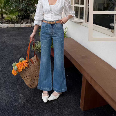 爆犀牛~重工烫钻修身微喇牛仔裤