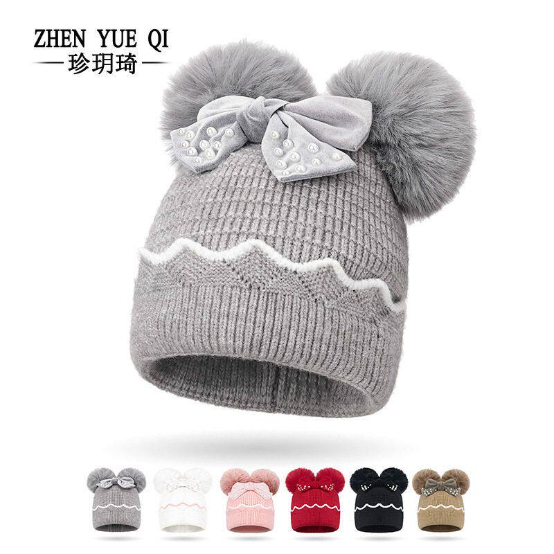 冬天小孩蝴蝶结双毛球保暖护耳女童针织帽柔软珍珠可爱宝宝毛线帽
