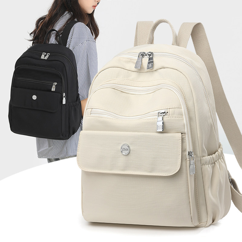 大容量双肩包女2025新款休闲旅行背包大学生书包多隔层百搭通勤包